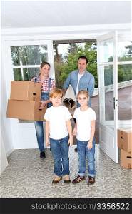 Family of 4 people moving in new home
