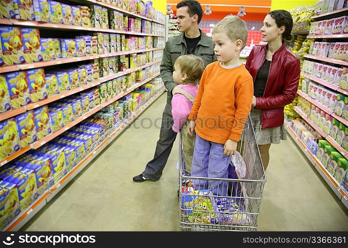 family of four in shop