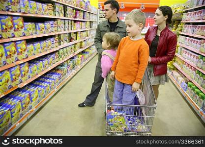 family of four in shop
