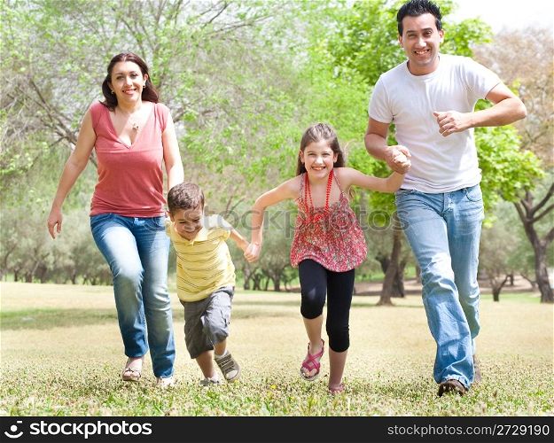 Family of four in the park,outdoor