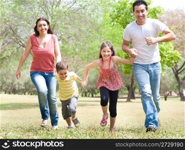 Family of four in the park,outdoor