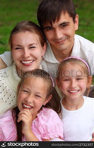 family of four outdoor in summer