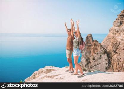 Family of two travel in the mountains. Concept of tourists in Europe. Happy family on vacation in the mountains