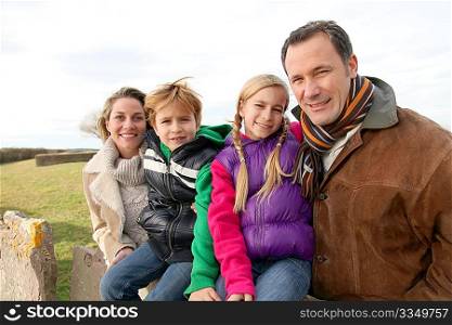 Family on a walk day in the countryside