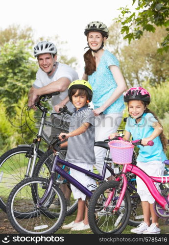 Family On Cycle Ride In Countryside