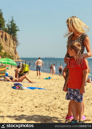 Family on summer trip.. Summer holidays and common travel. Lovely happy active family on vacation trip. Relatives spending enjoyable good time together.