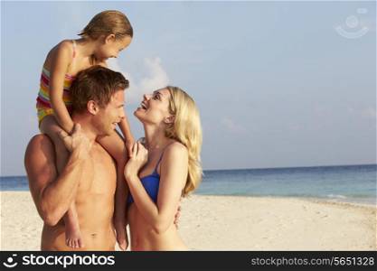 Family On Tropical Beach Holiday