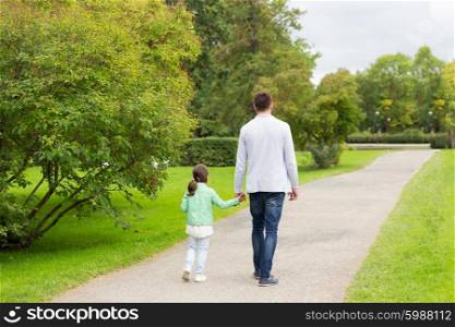 family, parenthood, fatherhood, adoption and people concept - happy father and little girl walking in summer park