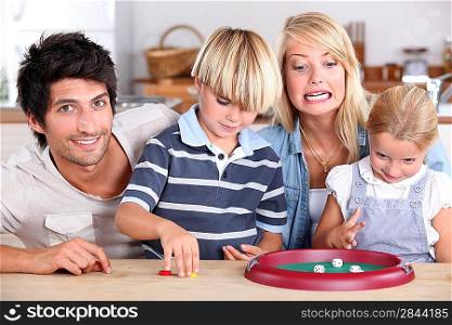 family playing dice