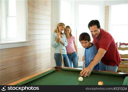 Family Playing Pool