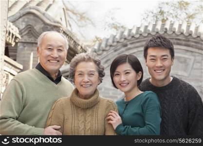 Family portrait- Grandparents, granddaughter and husband
