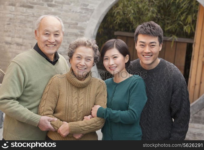 Family portrait Grandparents, granddaughter and husband