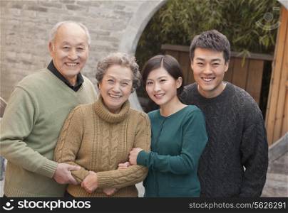 Family portrait Grandparents, granddaughter and husband