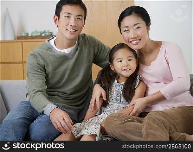 Family Posing on Sofa