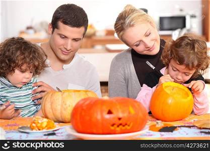 family preparing Halloween together