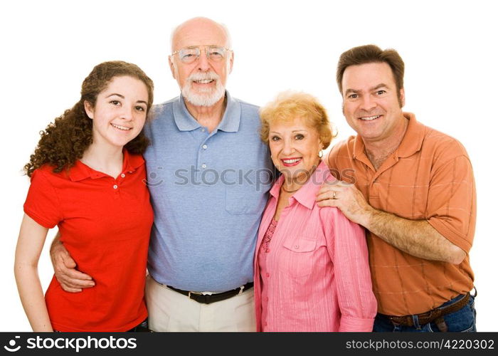 Family ranging in age from teen to seniors, isolated on white background.