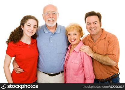 Family ranging in age from teen to seniors, isolated on white background.