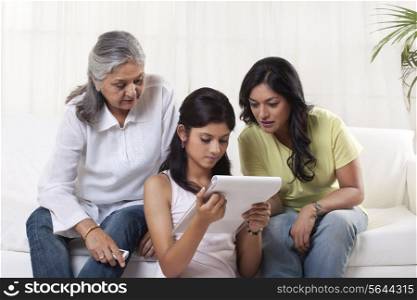 Family reading documents at home