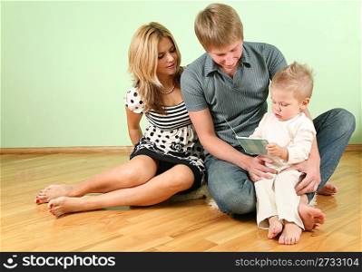family sit on floor