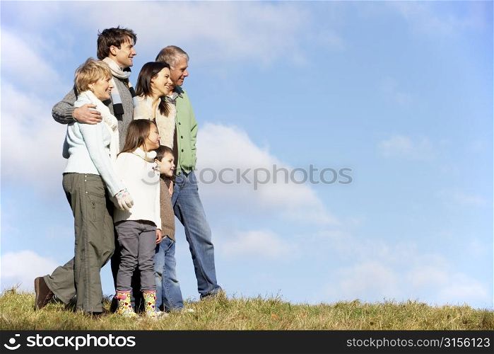 Family Standing In The Park