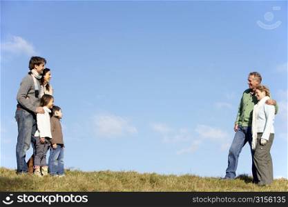 Family Standing In The Park