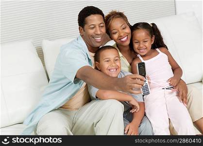 Family Taking Picture with Camera Phone