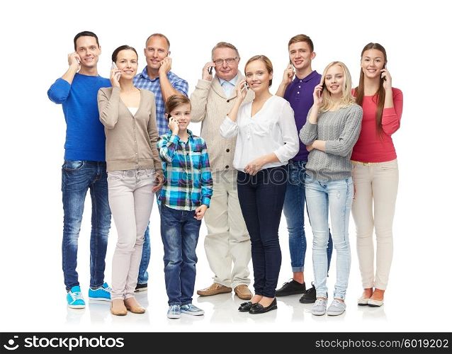 family, technology, generation and people concept - group of smiling men, women and boy with smartphones calling
