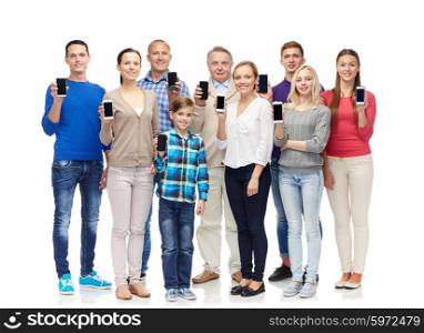 family, technology, generation and people concept - group of smiling men, women and boy with smartphones