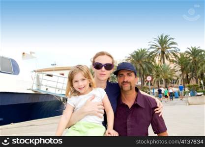 Family tourist in Ibiza town port in summer