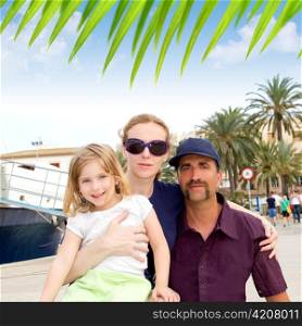 Family tourist in Ibiza town port in summer