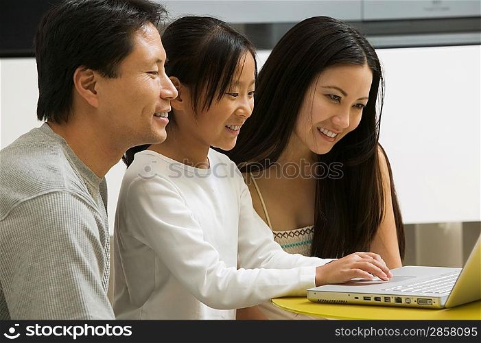 Family Using Laptop