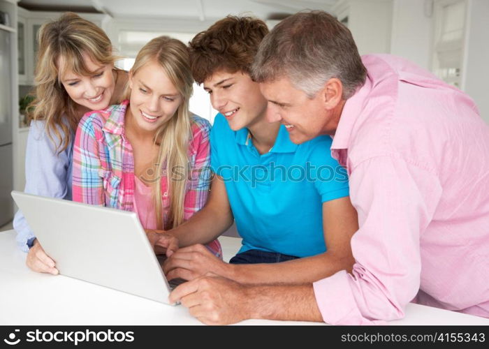 Family using laptop