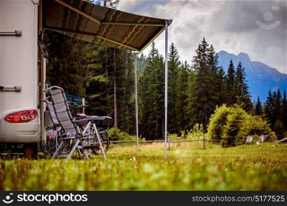 Family vacation travel, holiday trip in motorhome, Caravan car Vacation. Beautiful Nature Italy natural landscape Alps.