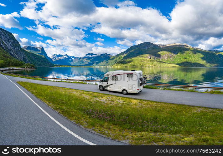 Family vacation travel RV, holiday trip in motorhome, Caravan car Vacation. Beautiful Nature Norway natural landscape.