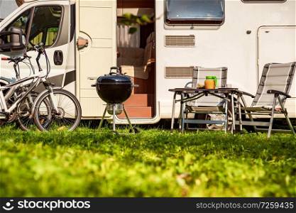 Family vacation travel RV, holiday trip in motorhome, Caravan car Vacation. Picnic with outdoor barbecue.