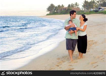 Family Walking along Hawaiian Beach