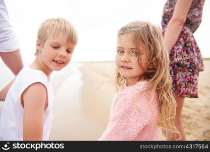 Family walking on beach