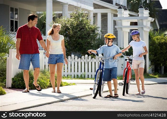 Family Walking with Bicycles
