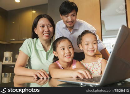 Family watching movie on the laptop