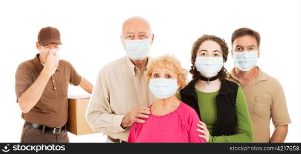 Family wearing surgical masks to protect from an epidemic, as a delivery man with the flu approaches. Banner isolated on white.