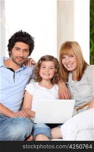 Family with a laptop