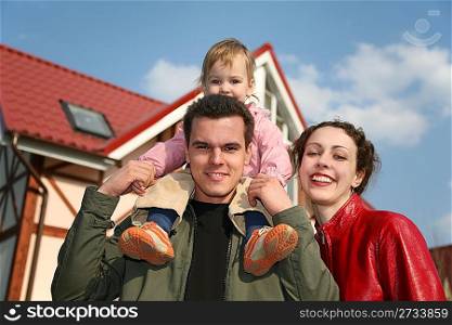 family with baby and house 2