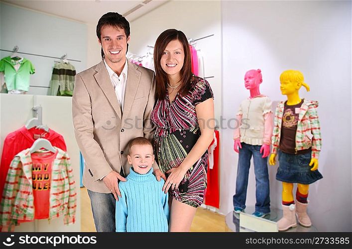 family with boy in Children`s shop