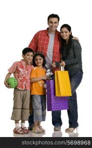Family with shopping bags