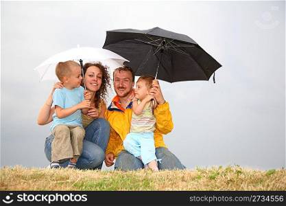 family with the umbrellas