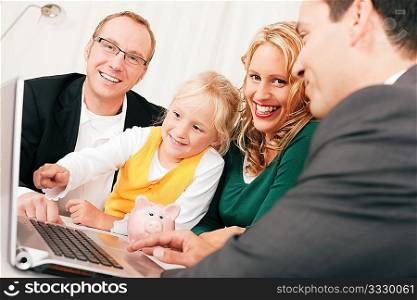 Family with their consultant (assets, money or similar) doing some financial planning - symbolized by a piggy bank in the front