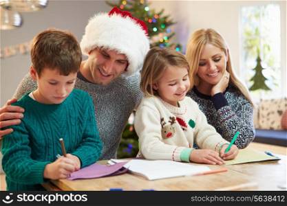 Family Writing Christmas Cards Together