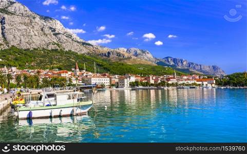 Famous Adriatic coast - Makarska riviera in Dalmatia. Town Makarska, promenade and marine. Splendid town and tourist resort Makarska, Croatia