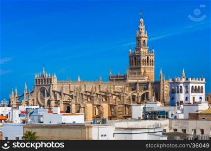 Famous Bell Tower named Giralda in landmark catholic Cathedral Saint Mary of the See, Seville, Andalusia, Spain