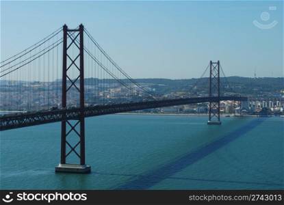 famous bridge Abril 25th and old Salazar Bridge in Lisbon, Portugal